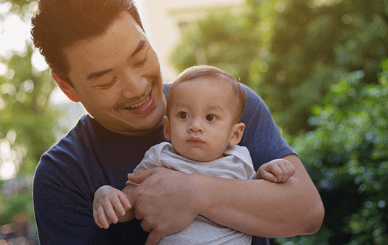 new dad with baby